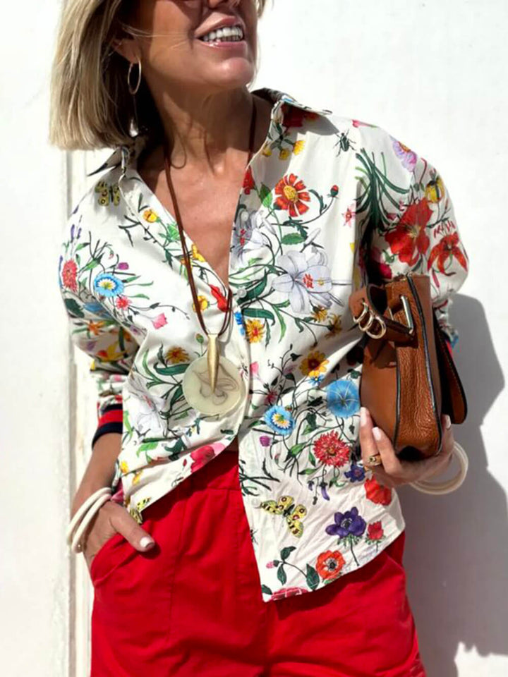Oversized blouse met unieke bloemenprint en knoopsluiting