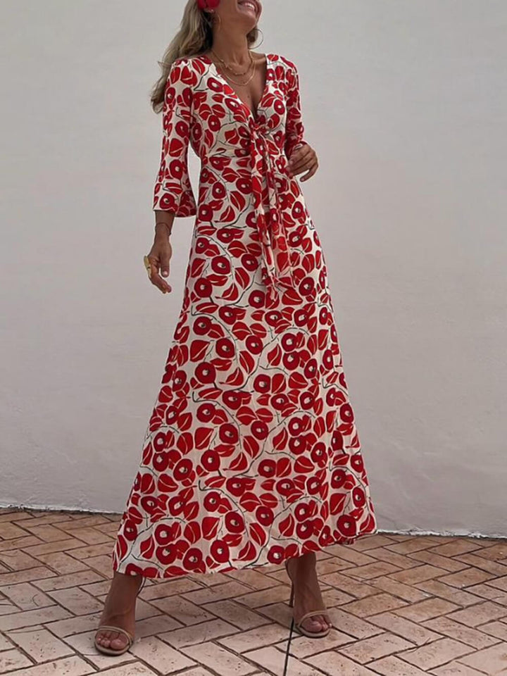 Vestido largo con bolsillos y hombros descubiertos con estampado floral de vacaciones