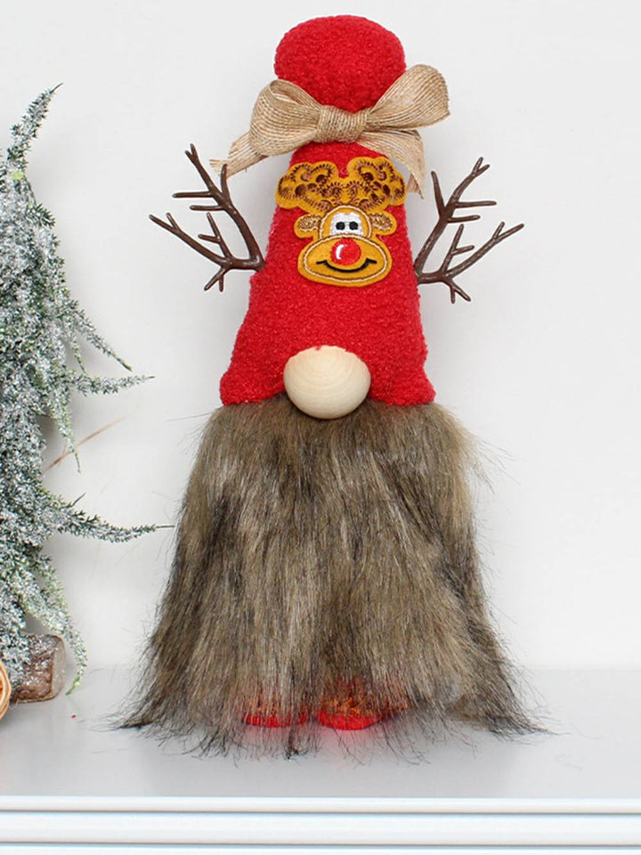 Decorazione natalizia con figura in piedi di bambola senza volto