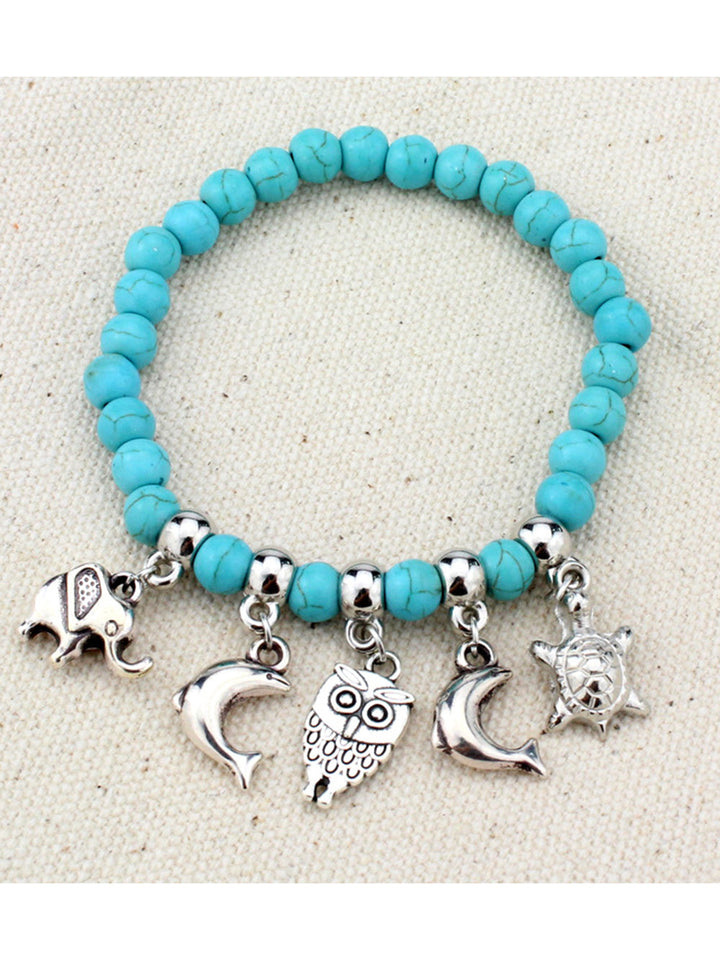 Türkisfarbenes modisches Elefanten-Kreuz-Armband