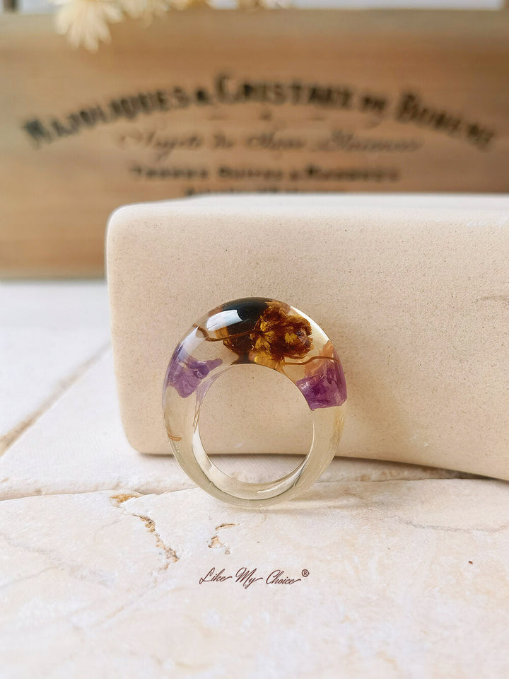 Dried flower resin ring with purple flowers