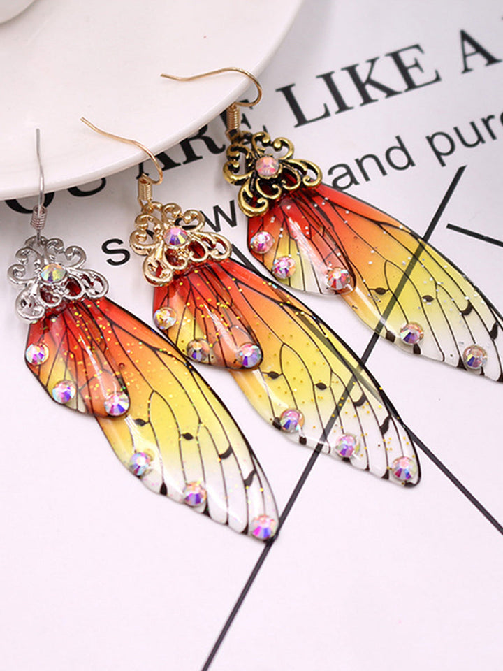 Pendientes de cristal de ala de cigarra con diamantes de imitación amarillos con ala de mariposa