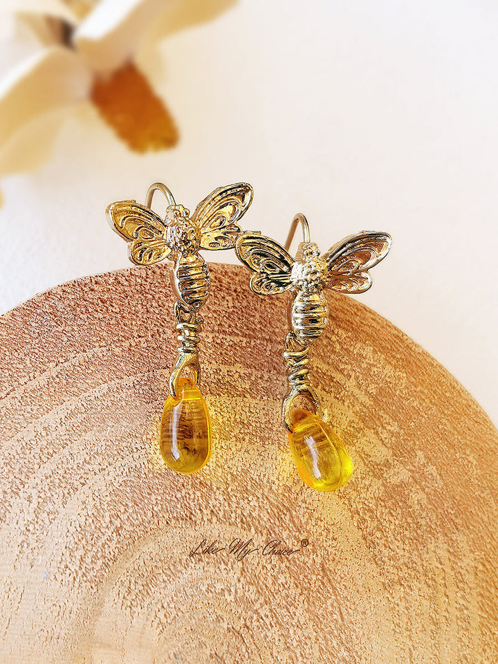 Goldene Retro-Ohrringe mit Bienenmotiv