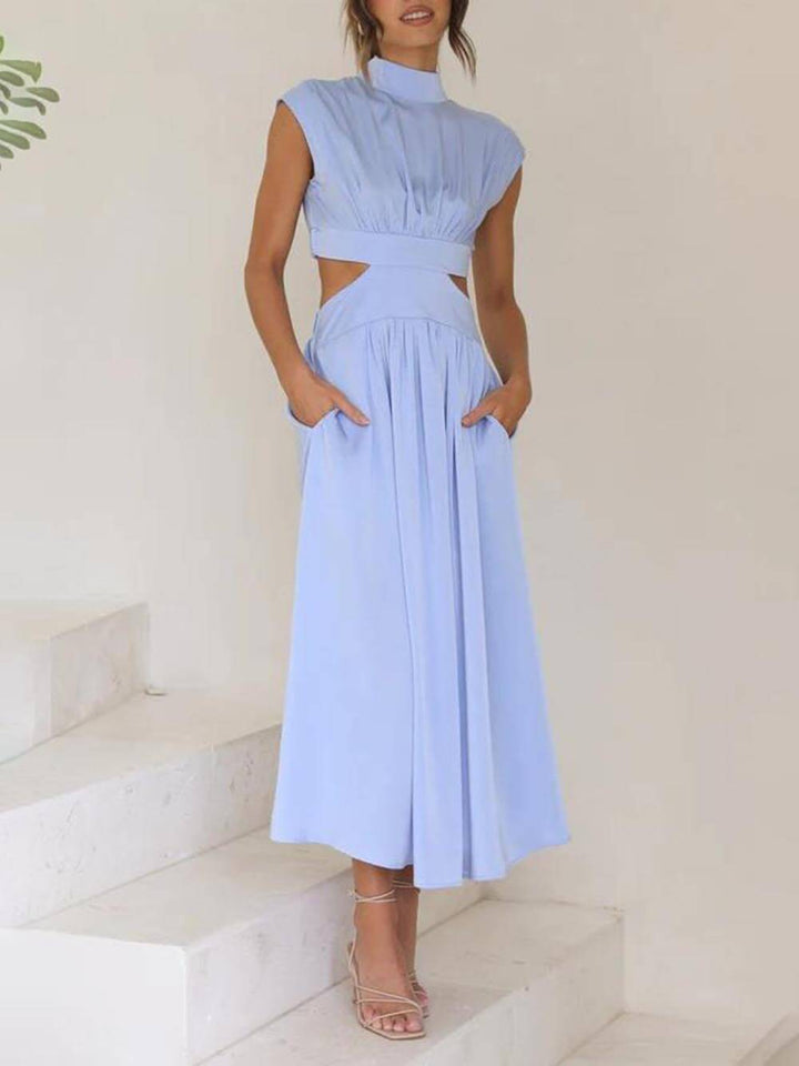 Robe midi de vacances avec poches et découpe à la taille