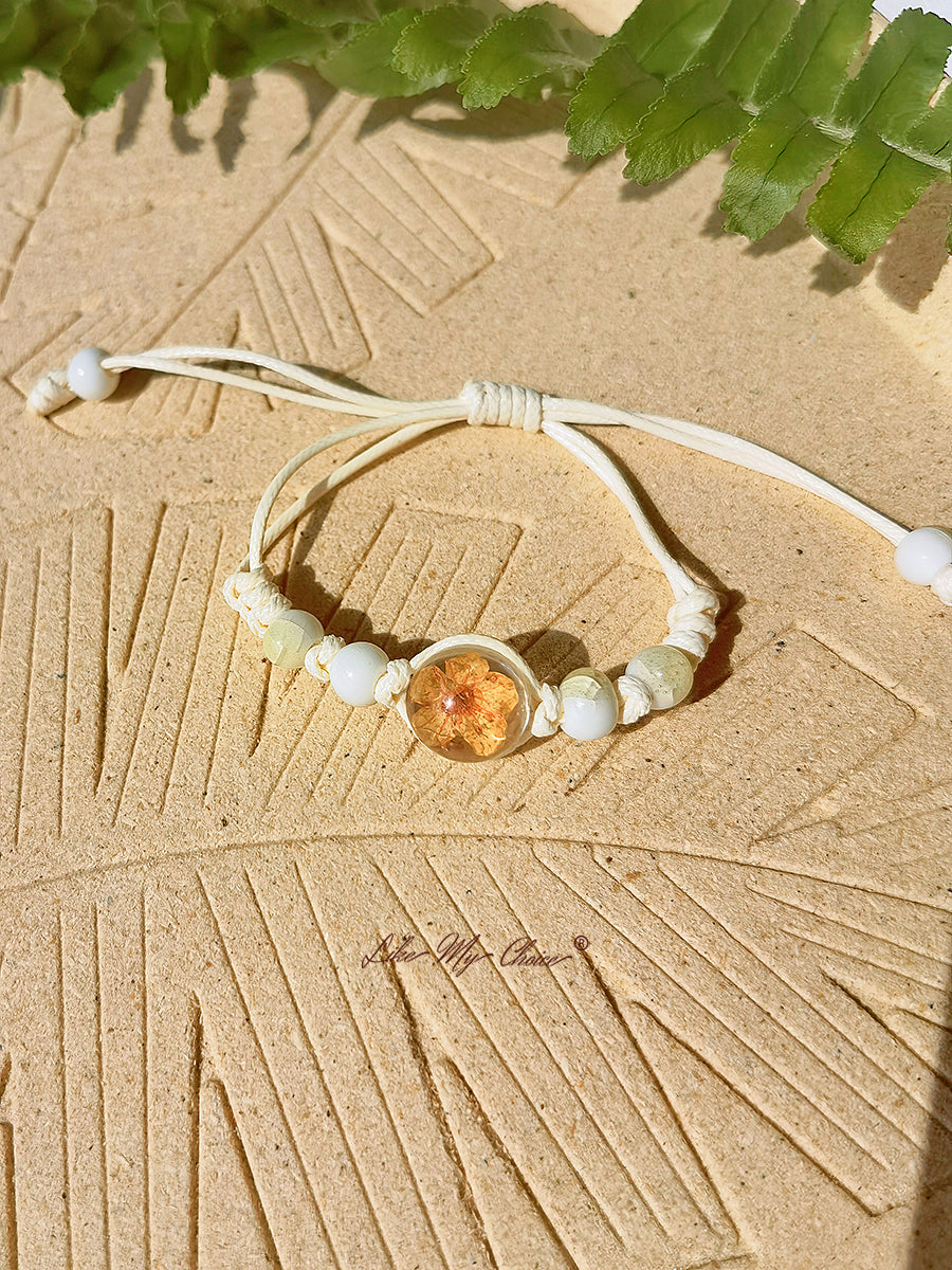 Pulsera trenzada de cerámica con piedra del tiempo de flor de cerezo