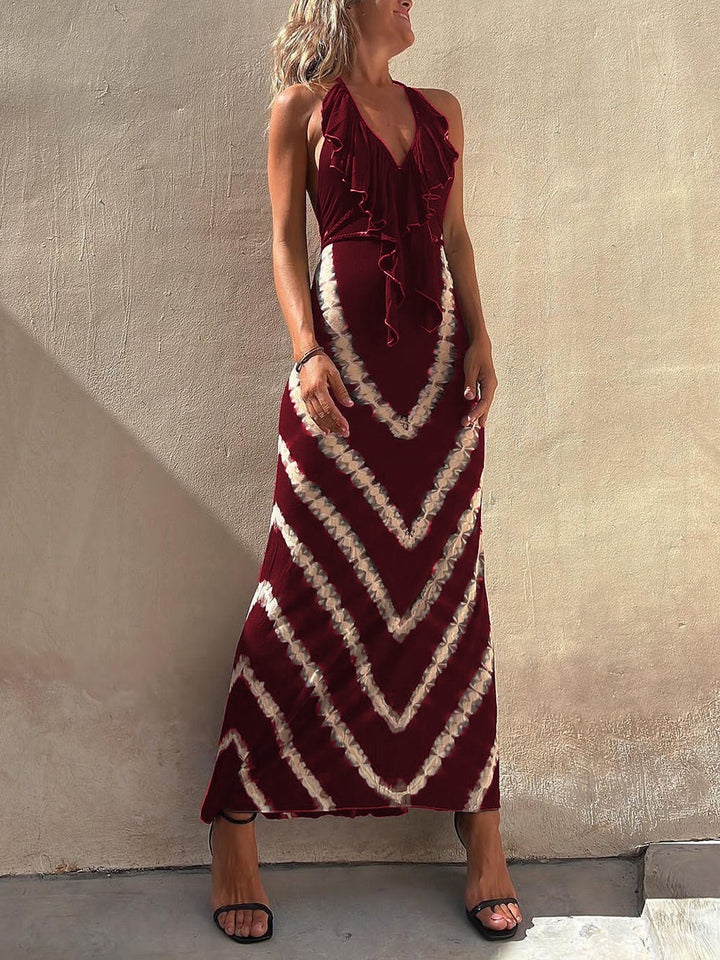 فستان Paulawow طويل بياقة على شكل حرف V وثنيات وطبعات أمامية