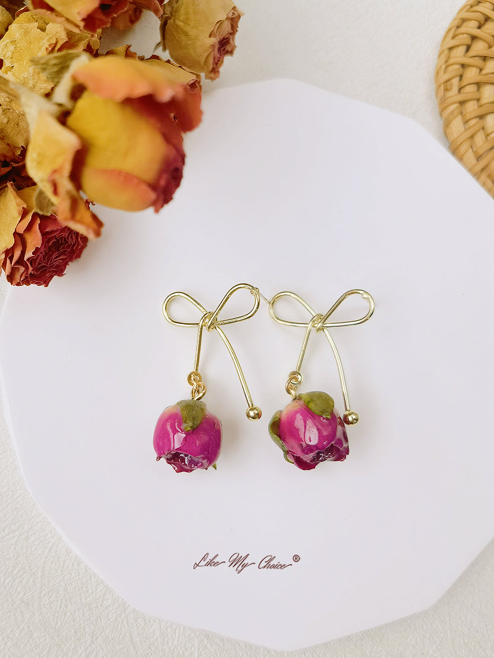 Σκουλαρίκια με ροζ φιόγκο αποξηραμένα λουλούδια