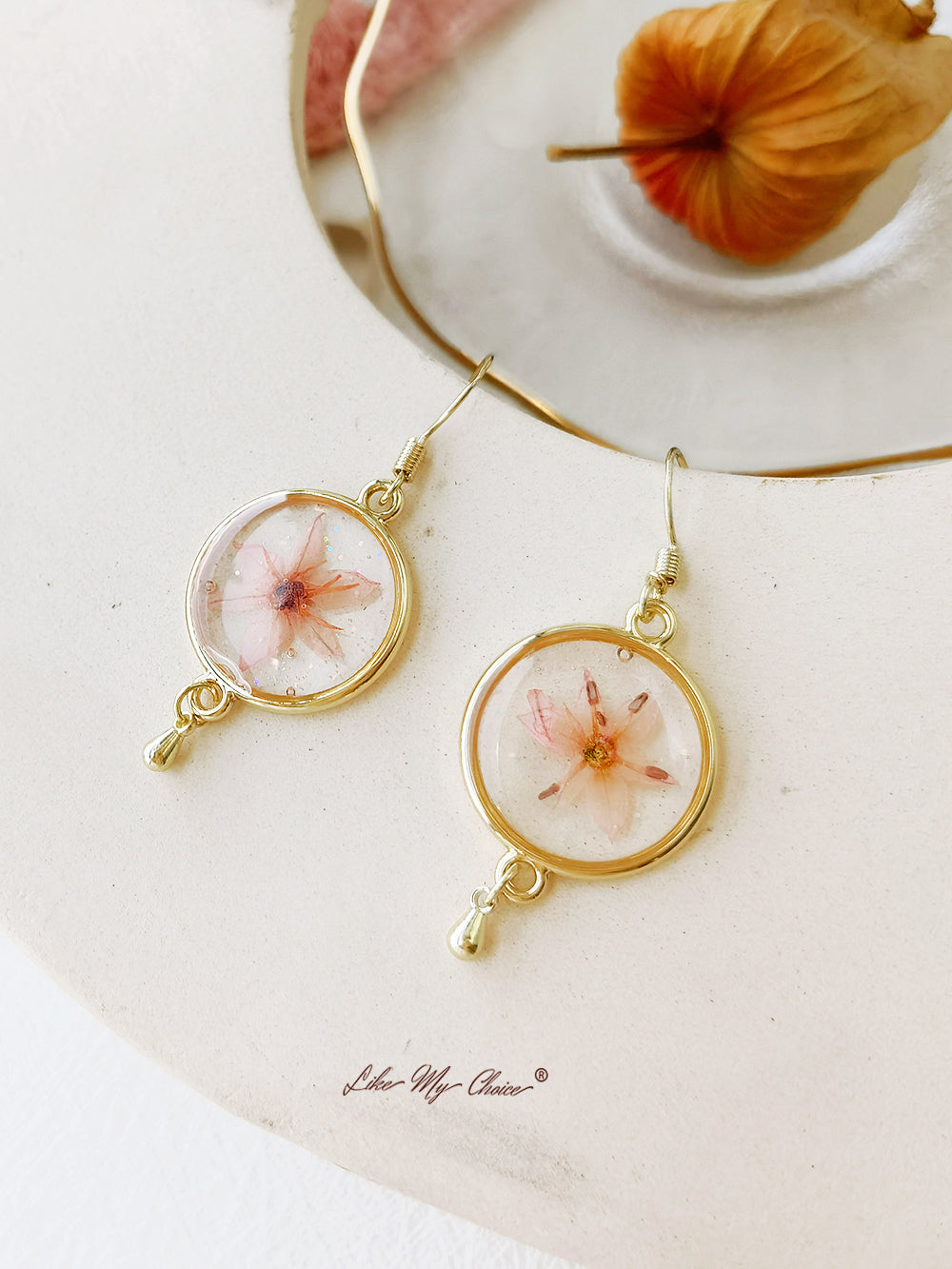 Pendientes de flores secas con borlas elegantes de color rosa