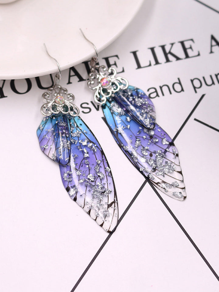 Pendientes de cristal de ala de cigarra con diamantes de imitación azules y alas de mariposa