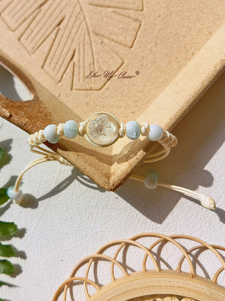 Pulsera trenzada de cerámica con piedra del tiempo de flor de cerezo