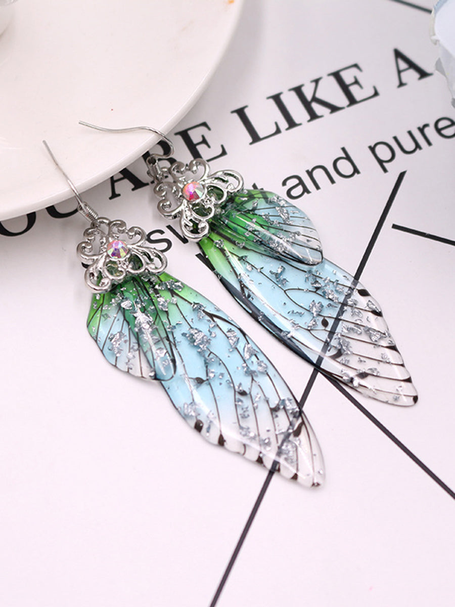 Κρυστάλλινα σκουλαρίκια με πτερύγια πεταλούδας με πράσινο στρας