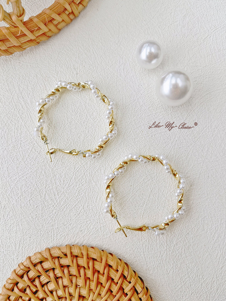 Musas de perlas caprichosas: aretes de perlas en espiral de inspiración bohemia