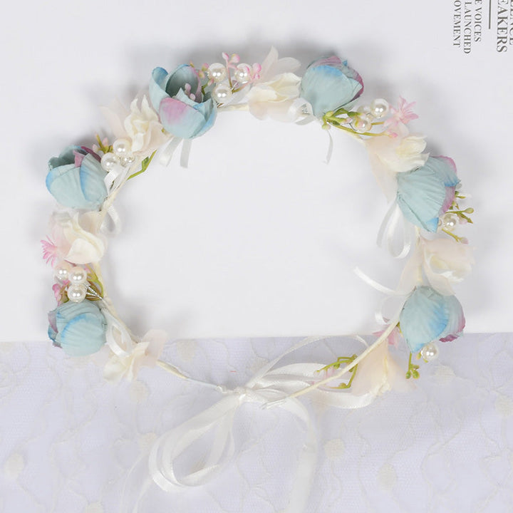 Corona de flores de perlas de hadas azules