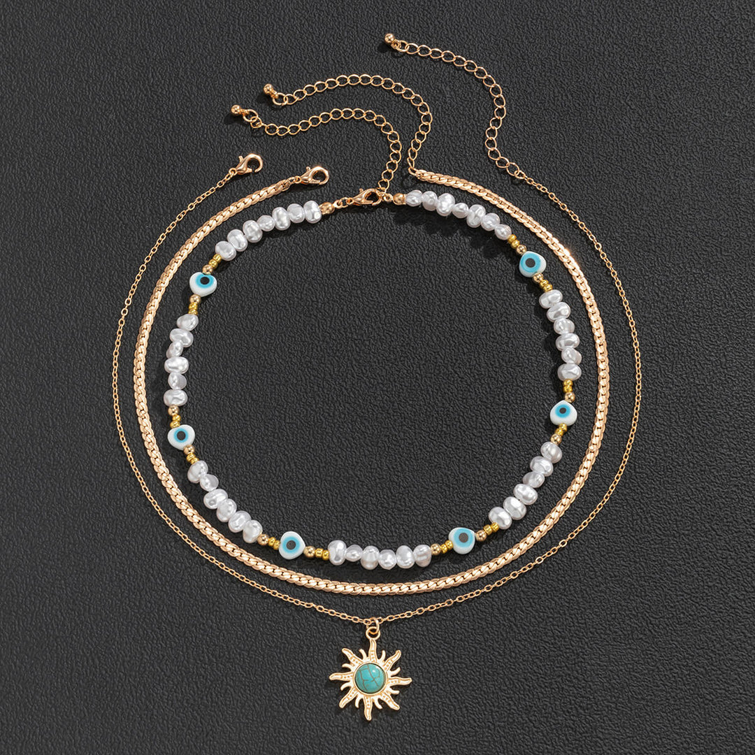 Halskette mit speziell geformten Imitationsperlen im ethnischen Stil, Retro-Türkis-Sonnenaugen-Halskette